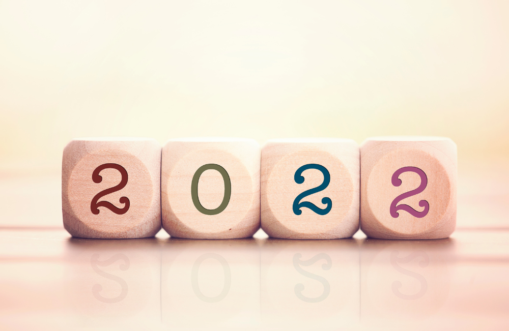 Four white cubes lined up to spell out the numbers 2022.